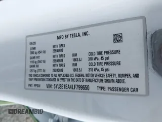 2020 Tesla Model 3 Standard Range Plus with VIN 5YJ3E1EA4LF799650, listed as a IAAI auction lot 41817538 with 54,835 mi miles. Bid and sale history available at carsss.com. Image 9.