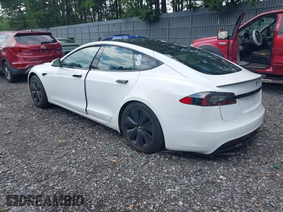 2021 Tesla Model S Plaid z VIN 5YJSA1E62MF452838, wystawiony jako IAAI lot #42726183 z przebiegiem 21 725 mil mil oraz . Historia ofert i sprzedaży dostępna na DreamBid. Obrazek 3.