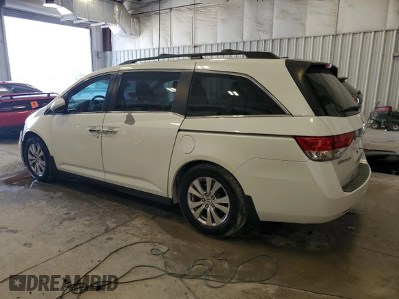 2014 Honda Odyssey EX-L with VIN 5FNRL5H60EB063614, listed as a Copart auction lot 59104265 with 212,665 mi miles and Non repairable. Bid and sale history available at DreamBid. Image 2.