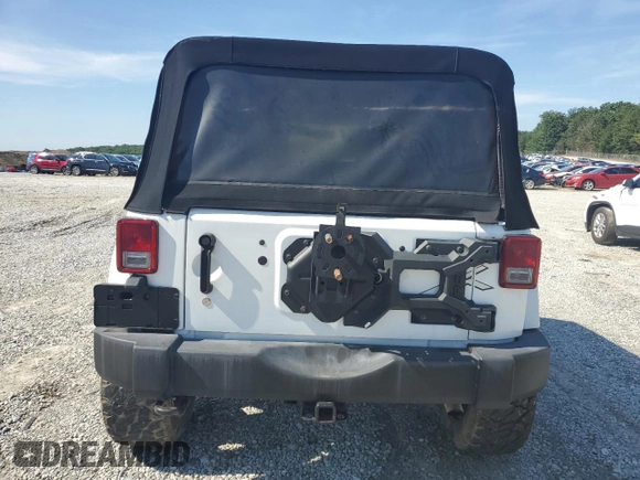 2015 Jeep Wrangler Unlimited Sahara with VIN 1C4BJWEG3FL584920, listed as a Copart auction lot 61843525 with 62,876 mi miles and Salvage title. Bid and sale history available at DreamBid. Image 6.