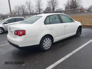 2009 Volkswagen Jetta S z VIN 3VWJZ71K49M129501, wystawiony jako IAAI lot #41461767 z przebiegiem 250 552 mil mil oraz . Historia ofert i sprzedaży dostępna na DreamBid. Obrazek 4.