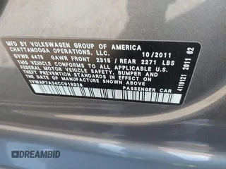 2012 Volkswagen Passat S w/Appearance with VIN 1VWAP7A34CC019328, listed as a IAAI auction lot 41393247 with 209,861 mi miles. Bid and sale history available at carsss.com. Image 9.