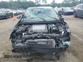 2010 Buick LaCrosse CX with VIN 1G4GB5EGXAF129997, listed as a Copart auction lot 61056505 with Not provided miles and Salvage title. Bid and sale history available at DreamBid. Image 5.