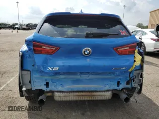 2018 BMW X2 xDrive28i z VIN WBXYJ5C32JEF72801, wystawiony jako Copart lot #56535445 z przebiegiem 45 497 mil mil oraz Szkody całkowita. Historia ofert i sprzedaży dostępna na DreamBid. Obrazek 6.