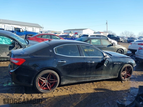2014 Maserati Ghibli z VIN ZAM57XSA4E1090315, wystawiony jako IAAI lot #41423507 z przebiegiem 115 323 mil mil oraz . Historia ofert i sprzedaży dostępna na DreamBid. Obrazek 14.