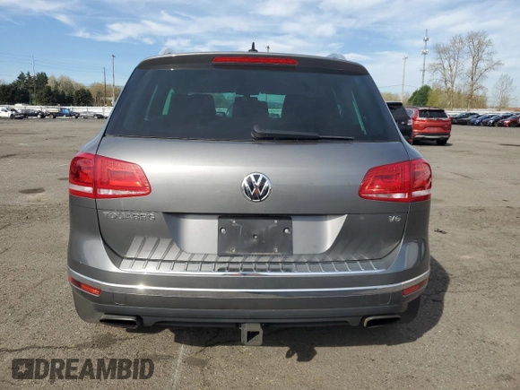 2016 Volkswagen Touareg Sport с VIN WVGEF9BPXGD007023, выставлен на аукционе Copart как лот 50760865 с пробегом 96 657 миль миль и Списание • Salvage title. История ставок и продаж доступна на DreamBid. Изображение 6.