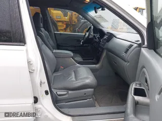2004 Honda Pilot EX with VIN 2HKYF185X4H571558, listed as a IAAI auction lot 41901839 with 196,703 mi miles. Bid and sale history available at carsss.com. Image 5.
