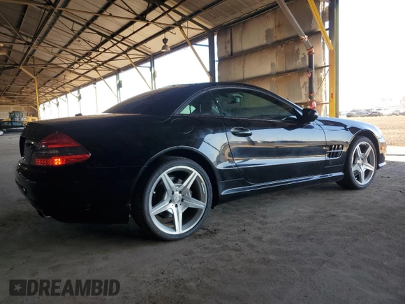 2011 Mercedes-Benz SL 550 z VIN WDBSK7BAXBF165859, wystawiony jako Copart lot #80166084 z przebiegiem 33 119 mil mil oraz Czysty tytuł • Clean title. Historia ofert i sprzedaży dostępna na DreamBid. Obrazek 3.
