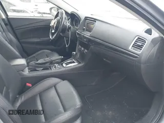 2014 Mazda 6 i Touring with VIN JM1GJ1V60E1141831, listed as a IAAI auction lot 42131200 with 86,597 mi miles and . Bid and sale history available at DreamBid. Image 5.