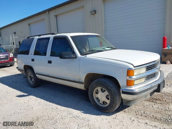 1996 Chevrolet Tahoe Limited with VIN 1GNEC13R0TJ309292, listed as a IAAI auction lot 41412643 with 219,815 mi miles. Bid and sale history available at carsss.com. Image 1.