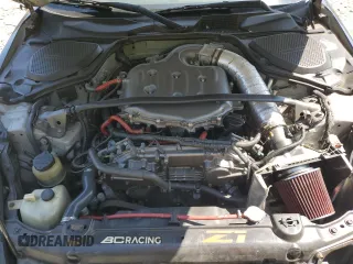 2004 Nissan 350Z Touring with VIN JN1AZ34E54T052703, listed as a Copart auction lot 70016184 with 170,619 mi miles and Salvage Title. Bid and sale history available at carsss.com. Image 12.