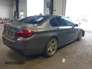 2014 BMW 5 Series 528i xDrive with VIN WBA5A7C5XED613856, listed as a IAAI auction lot 42018901 with 121,783 mi miles and . Bid and sale history available at DreamBid. Image 4.