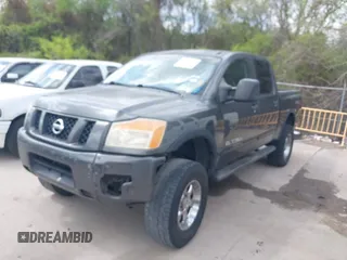 2011 Nissan Titan Pro-4X with VIN 1N6BA0EC3BN320795, listed as a IAAI auction lot 41868113 with 183,919 mi miles and . Bid and sale history available at DreamBid. Image 2.