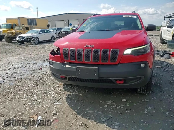 2019 Jeep Cherokee Trailhawk с VIN 1C4PJMBX3KD256495, выставлен на аукционе Copart как лот 56122695 с пробегом 98 786 миль миль и Списание • Salvage title. История ставок и продаж доступна на DreamBid. Изображение 15.