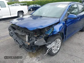 2021 Hyundai Accent SE z VIN 3KPC24A64ME132662, wystawiony jako IAAI lot #42203276 z przebiegiem 97 918 mil mil oraz . Historia ofert i sprzedaży dostępna na DreamBid. Obrazek 6.