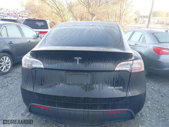 2022 Tesla Model Y Performance with VIN 7SAYGDEF3NF397671, listed as a IAAI auction lot 41459991 with NaN miles. Bid and sale history available at carsss.com. Image 15.