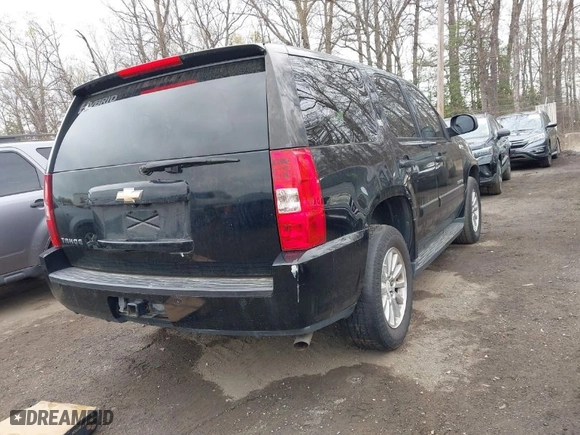 2008 Chevrolet Tahoe Hybrid with VIN 1GNFK135X8R185240, listed as a IAAI auction lot 41959400 with 194,136 mi miles. Bid and sale history available at carsss.com. Image 4.