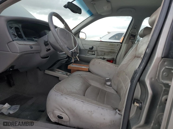 1999 Ford Crown Victoria LX with VIN 2FAFP74W7XX234277, listed as a Copart auction lot 84859854 with 0 mi miles and Clean Title. Bid and sale history available at carsss.com. Image 7.