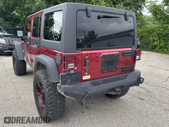 2012 Jeep Wrangler Unlimited Sport with VIN 1C4BJWDG5CL289329, listed as a Copart auction lot 65816775 with 152,632 mi miles and Clean title. Bid and sale history available at DreamBid. Image 3.
