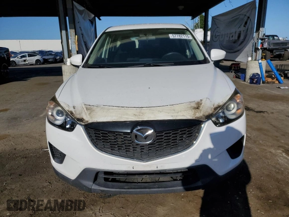2013 Mazda CX-5 Sport with VIN JM3KE2BE7D0148951, listed as a Copart auction lot 57782115 with 65,677 mi miles and Salvage title. Bid and sale history available at DreamBid. Image 5.