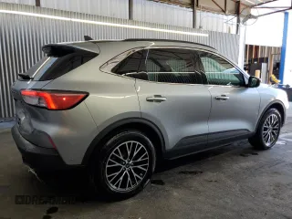 2021 Ford Escape Titanium Plug-In Hybrid z VIN 1FMCU0LZ8MUA66995, wystawiony jako Copart lot #60986765 z przebiegiem 69 609 mil mil oraz Czysty tytuł • Clean title. Historia ofert i sprzedaży dostępna na DreamBid. Obrazek 3.