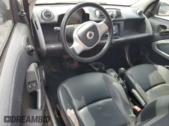 2013 Smart fortwo Pure с VIN WMEEJ3BA9DK618746, выставлен на аукционе Copart как лот 56752885 с пробегом 80 293 миль миль и Списание • Salvage title. История ставок и продаж доступна на DreamBid. Изображение 8.