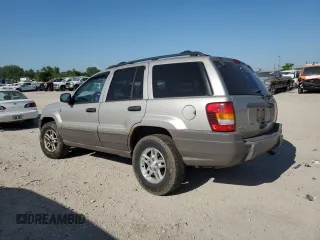 2004 Jeep Grand Cherokee Laredo with VIN 1J4GW48S34C307347, listed as a Copart auction lot 55749565 with Not provided miles and Salvage title. Bid and sale history available at DreamBid. Image 2.