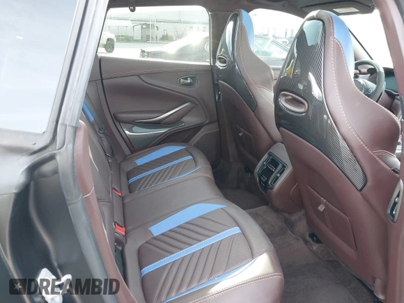 2023 Aston Martin DBX 707 z VIN SD7VUJBW8PTV07531, wystawiony jako IAAI lot #41608734 z przebiegiem 8476 mil mil oraz . Historia ofert i sprzedaży dostępna na DreamBid. Obrazek 8.
