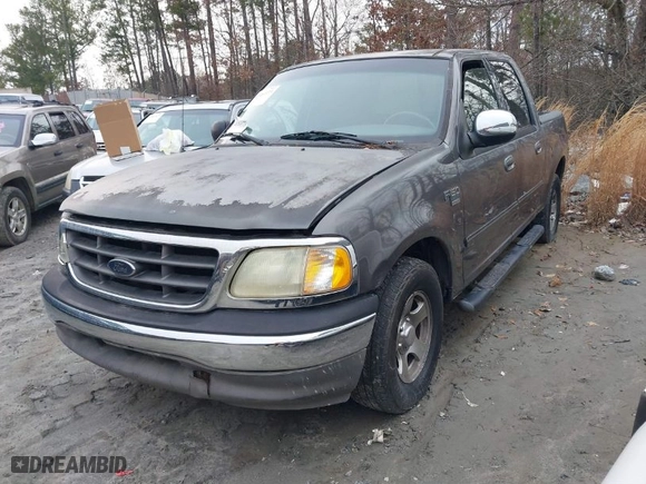 2002 Ford F-150 XLT with VIN 1FTRW07L72KC51644, listed as a IAAI auction lot 41460373 with 1 mi miles. Bid and sale history available at carsss.com. Image 2.