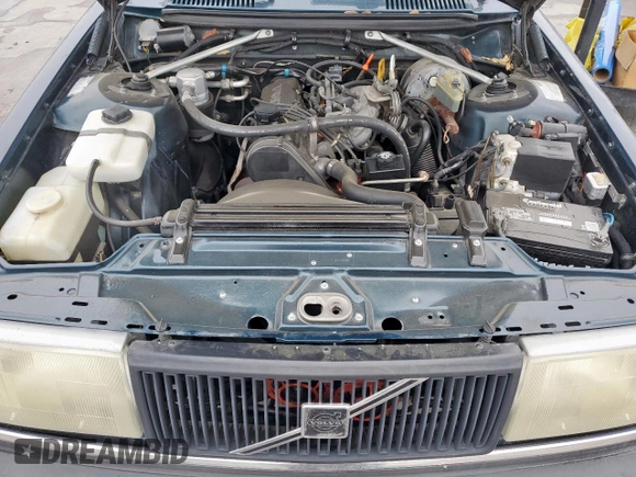 1992 Volvo 240 z VIN YV1AS8805N1467833, wystawiony jako Copart lot #51828515 z przebiegiem 178 826 mil mil oraz Szkoda całkowita • Salvage title. Historia ofert i sprzedaży dostępna na DreamBid. Obrazek 11.