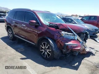 2021 Honda Pilot Touring 7-Passenger with VIN 5FNYF5H63MB032987, listed as a IAAI auction lot 42587882 with Not provided miles and . Bid and sale history available at DreamBid. Image 1.