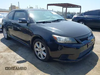 2012 Scion tC with VIN JTKJF5C79C3025581, listed as a IAAI auction lot 42170728 with 92,842 mi miles. Bid and sale history available at carsss.com. Image 1.