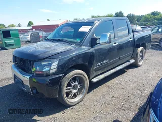 2005 Nissan Titan LE with VIN 1N6AA07B05N509859, listed as a IAAI auction lot 42662424 with 252,000 mi miles and . Bid and sale history available at DreamBid. Image 2.