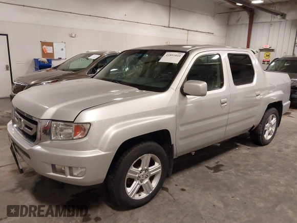 2009 Honda Ridgeline RTL with VIN 2HJYK16519H000129, listed as a IAAI auction lot 41891810 with 186,124 mi miles. Bid and sale history available at carsss.com. Image 19.