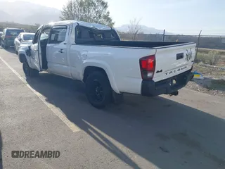 2022 Toyota Tacoma SR5 with VIN 3TMDZ5BNXNM122169, listed as a IAAI auction lot 41992758 with 36,686 mi miles and . Bid and sale history available at DreamBid. Image 3.