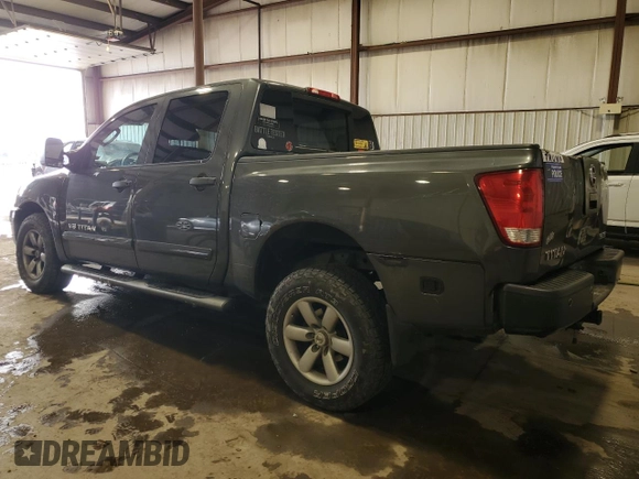 2010 Nissan Titan LE with VIN 1N6AA0EC2AN325657, listed as a Copart auction lot 88307625 with 147,010 mi miles and Salvage Title. Bid and sale history available at carsss.com. Image 2.