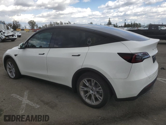 2023 Tesla Model Y Long Range z VIN 7SAYGDEE3PF916132, wystawiony jako Copart lot #51645625 z przebiegiem 28 238 mil mil oraz Szkoda całkowita • Salvage title. Historia ofert i sprzedaży dostępna na DreamBid. Obrazek 2.