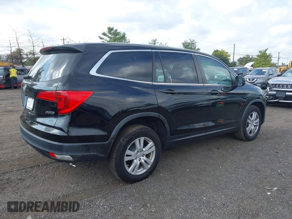 2016 Honda Pilot LX with VIN 5FNYF6H16GB095208, listed as a IAAI auction lot 40512118 with 150,280 mi miles. Bid and sale history available at carsss.com. Image 4.