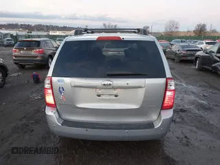 2007 Kia Sedona LX with VIN KNDMB233976172127, listed as a IAAI auction lot 41557356 with 164,383 mi miles. Bid and sale history available at carsss.com. Image 16.