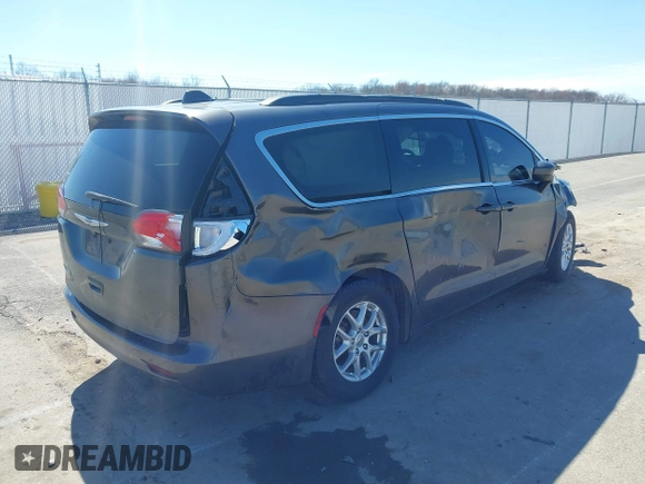 2021 Chrysler Voyager LXi with VIN 2C4RC1DGXMR519600, listed as a IAAI auction lot 41813991 with 87,187 mi miles and . Bid and sale history available at DreamBid. Image 4.