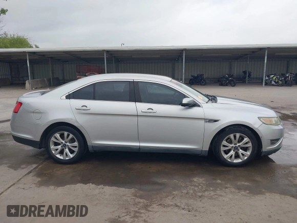 2011 Ford Taurus SEL with VIN 1FAHP2EW1BG117660, listed as a IAAI auction lot 42133767 with 204,965 mi miles and . Bid and sale history available at DreamBid. Image 13.