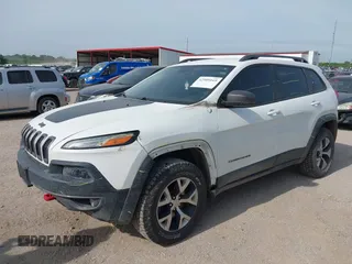 2015 Jeep Cherokee Trailhawk with VIN 1C4PJMBS6FW687718, listed as a IAAI auction lot 42505169 with 122,526 mi miles and . Bid and sale history available at DreamBid. Image 18.