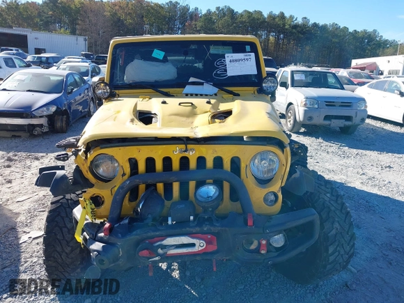 2015 Jeep Wrangler Unlimited Rubicon z VIN 1C4BJWFG4FL681946, wystawiony jako IAAI lot #40809597 z przebiegiem 57 148 mil mil oraz . Historia ofert i sprzedaży dostępna na DreamBid. Obrazek 12.