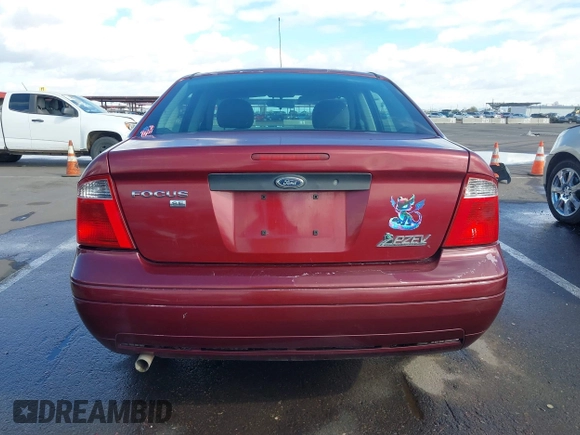 2007 Ford Focus S z VIN 1FAHP34NX7W114297, wystawiony jako IAAI lot #41774573 z przebiegiem 111 079 mil mil oraz . Historia ofert i sprzedaży dostępna na DreamBid. Obrazek 17.