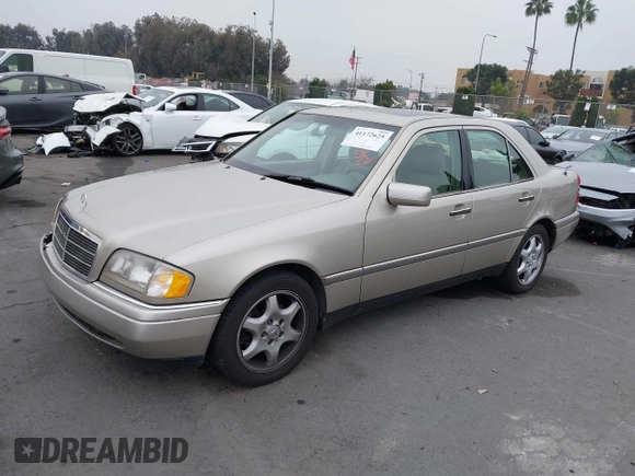 1995 Mercedes-Benz C with VIN WDBHA28E2SF191740, listed as a IAAI auction lot 41172625 with 331,540 mi miles. Bid and sale history available at carsss.com. Image 2.