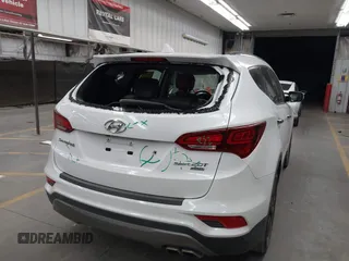 2017 Hyundai Santa Fe Ultimate with VIN 5NMZW4LA0HH040141, listed as a IAAI auction lot 42603243 with 140,817 mi miles and . Bid and sale history available at DreamBid. Image 6.