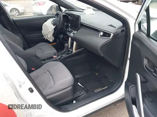 2023 Toyota Corolla Cross Hybrid S with VIN 7MUFBABG0PV004809, listed as a IAAI auction lot 41489550 with 59,172 mi miles and . Bid and sale history available at DreamBid. Image 5.