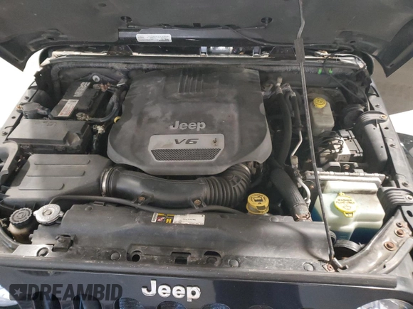 2015 Jeep Wrangler Unlimited Sahara with VIN 1C4BJWEG5FL611521, listed as a Copart auction lot 50609985 with 207,473 mi miles and Salvage Title. Bid and sale history available at carsss.com. Image 14.