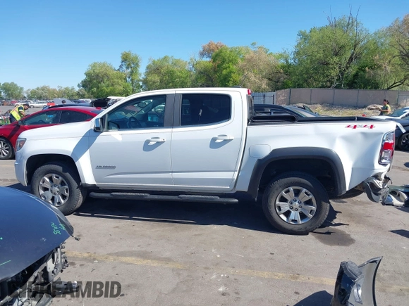 2018 Chevrolet Colorado 4WD LT with VIN 1GCGTCEN4J1297748, listed as a IAAI auction lot 42181410 with 92,649 mi miles and . Bid and sale history available at DreamBid. Image 14.