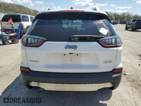 2019 Jeep Cherokee Latitude Plus with VIN 1C4PJMLB2KD199130, listed as a Copart auction lot 54549035 with 99,128 mi miles and Salvage Title. Bid and sale history available at carsss.com. Image 6.